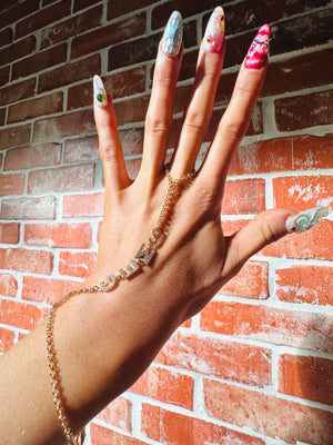 Dripping in Gems Hand Chain