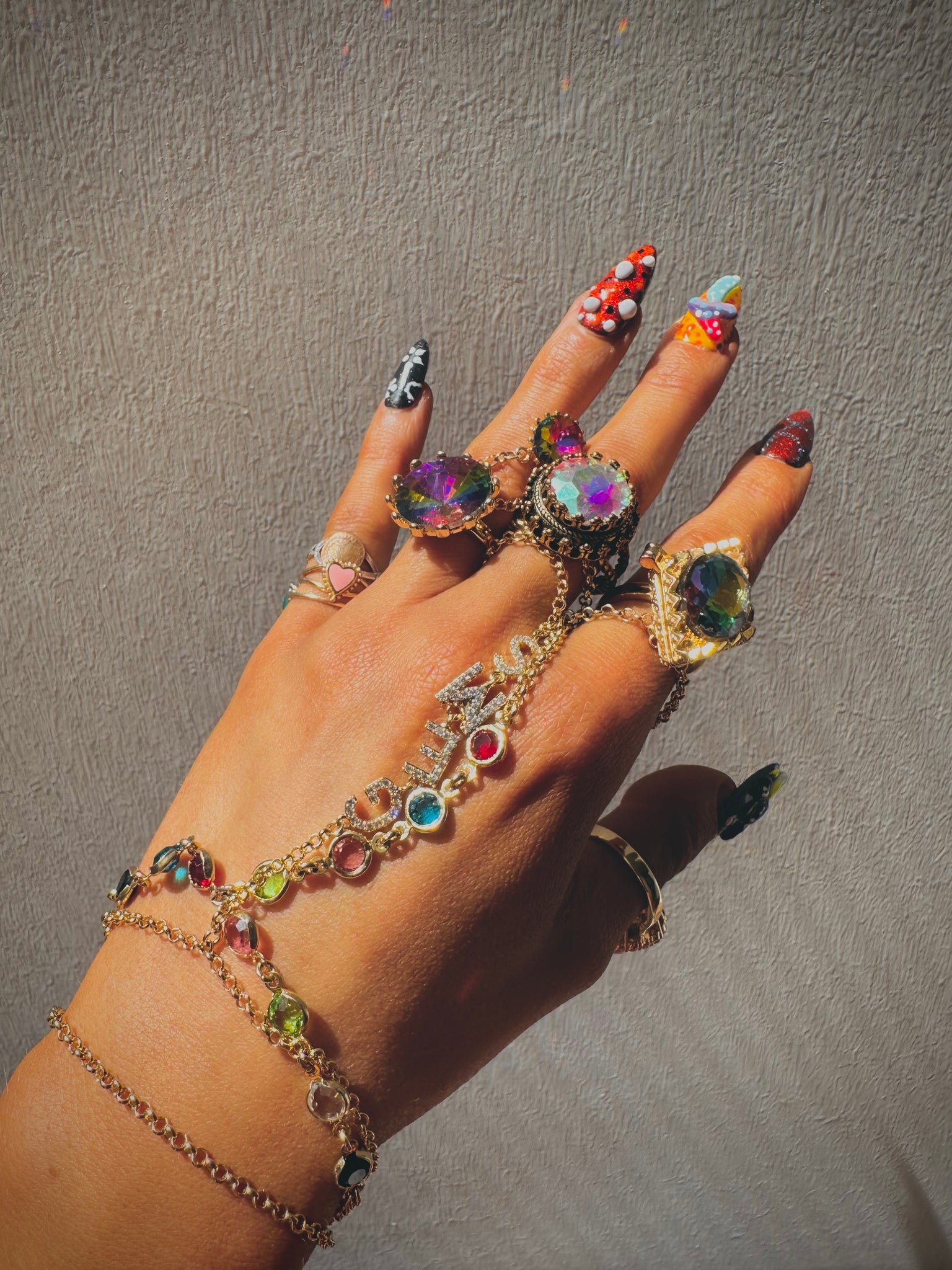 Dripping in Gems Hand Chain